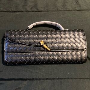 Elegant Black Woven Clutch